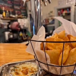 Eridanus Brewing - Fresh fried flour chips and spinach dip