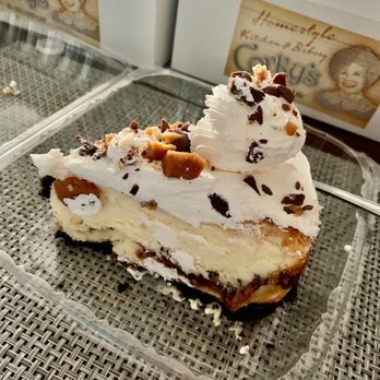 Corky's Kitchen & Bakery - Snickers cheesecake, jumbo slice ! - American Near Me - Pomona, California Corky's Kitchen & Bakery - Snickers cheesecake, jumbo slice ! - American Near Me - Pomona, California