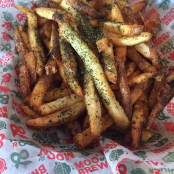 Moo & Brew - Rosemary truffle fries. I think these just have truffle seasoning. Too much Rosemary. - Beer Bar Near Me - Charlotte, North Carolina