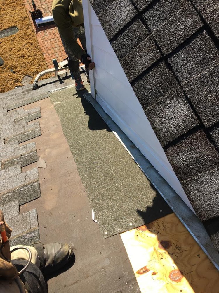 Slide of Rocco’s Roofing