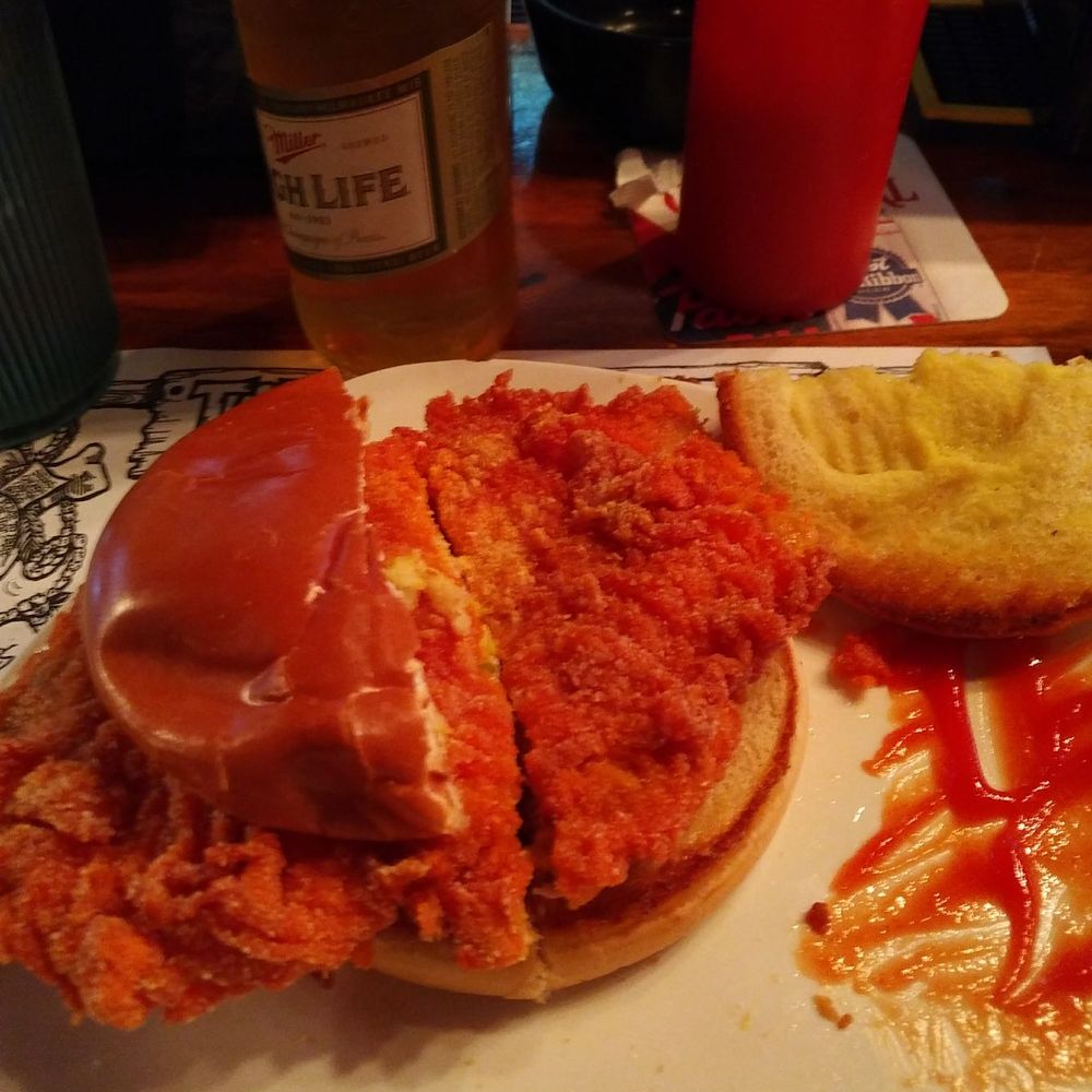 Top Notch Bar - The lighting doesn't do the orange tenderloin justice, but it's orange. - Pubs Near Me - Brookston, Indiana Top Notch Bar - The lighting doesn't do the orange tenderloin justice, but it's orange. - Pubs Near Me - Brookston, Indiana