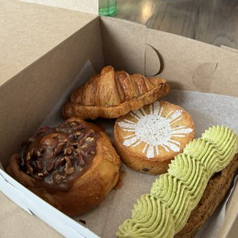 Kasama - pecan sticky bun (left), coconut passionfruit pineapple croissant (top), matcha pandan eclair (right) - Filipino Near Me - Chicago, Illinois