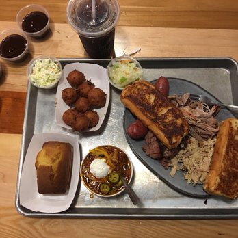 City Barbeque - City Sampler w/ brisket, pork, sausage, chicken, brisket chili bowl, cornbread, coleslaw(s), hush puppies, and toast. - Barbeque Near Me - Charlotte, North Carolina City Barbeque - City Sampler w/ brisket, pork, sausage, chicken, brisket chili bowl, cornbread, coleslaw(s), hush puppies, and toast. - Barbeque Near Me - Charlotte, North Carolina