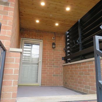 Pitch Concepts - Side Deck with cedar slat ceiling with 4 over head can lights, custom louvers and composite decking with picture frame - Landscape Architects or Designers Near Me - Chicago, Illinois Pitch Concepts - Side Deck with cedar slat ceiling with 4 over head can lights, custom louvers and composite decking with picture frame - Landscape Architects or Designers Near Me - Chicago, Illinois