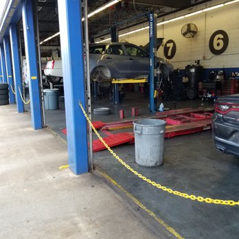 Pep Boys - This is my car on the lift with the hood up and head gasket off, front and back passenger tires off just to fix a flat tire. - Auto Repair Near Me - Fort Myers, Florida Pep Boys - This is my car on the lift with the hood up and head gasket off, front and back passenger tires off just to fix a flat tire. - Auto Repair Near Me - Fort Myers, Florida