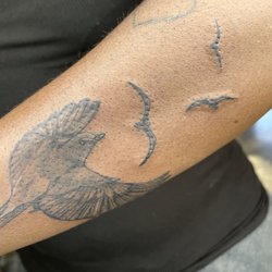Golden Ink Studios - Flying bird tattoo