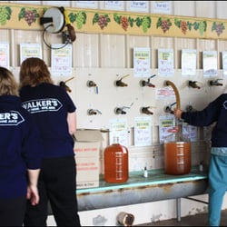 Walker's Wine Juice - Filling carboys.
