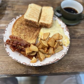 Table One - 2 eggs scrambled with cheese , French toast , home fries, one meat (bacon) ,and white toast. - Sandwiches Near Me - Middle Township, New Jersey Table One - 2 eggs scrambled with cheese , French toast , home fries, one meat (bacon) ,and white toast. - Sandwiches Near Me - Middle Township, New Jersey