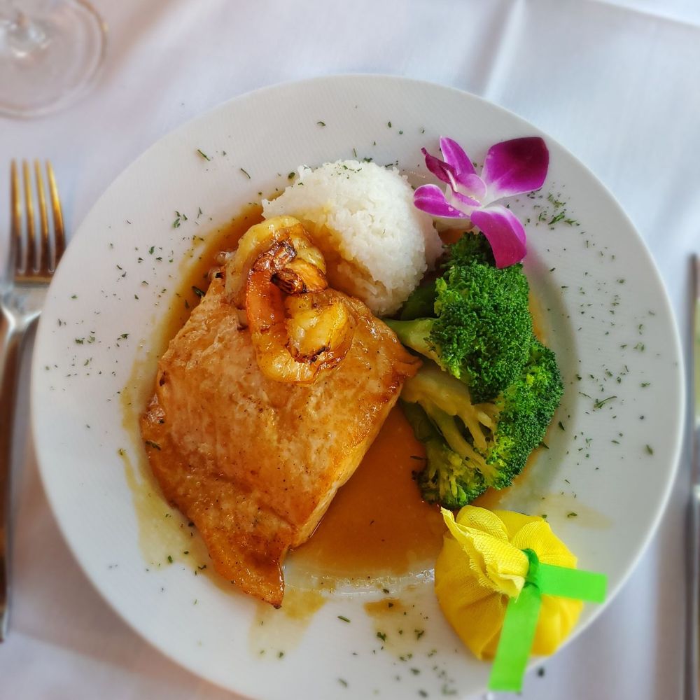 Thistle Lodge Beachfront Restaurant - Salmon special - New American Near Me - Sanibel, Florida Thistle Lodge Beachfront Restaurant - Salmon special - New American Near Me - Sanibel, Florida