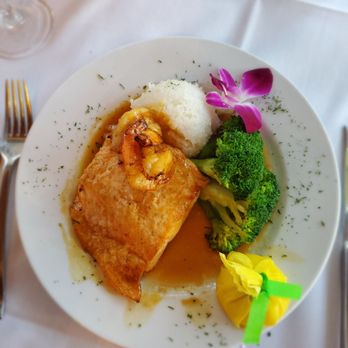 Thistle Lodge Beachfront Restaurant - Salmon special - New American Near Me - Sanibel, Florida Thistle Lodge Beachfront Restaurant - Salmon special - New American Near Me - Sanibel, Florida