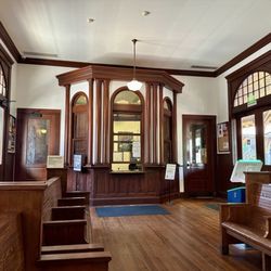 Amtrak - Main ticketing desk, part of seating area, and self service kiosk, May 2026.