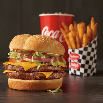 Rally's - This big, bold burger is made with two large 100% beef hamburger patties, two slices of melted American cheese, crisp iceberg... - Burgers Near Me - Columbus, Ohio Rally's - This big, bold burger is made with two large 100% beef hamburger patties, two slices of melted American cheese, crisp iceberg... - Burgers Near Me - Columbus, Ohio
