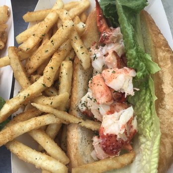 Claws - Naked Lobster Roll $22- served on a huge hoagie roll, minimal lobster meat- wasn't impressed in the slightest! - Seafood Near Me - West Sayville, New York