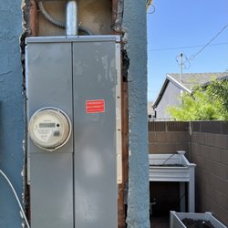 Rick Davis - Plaster Repair Specialist - Newly installed electrical panel in need of stucco patching
