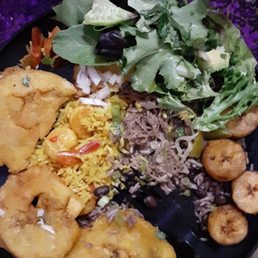 In this picture we have Yellow rice with shrimp Arroz Amarillo con Vegetales gluten free. Moros y Cristianos tostones, ropa vieja In this picture we have Yellow rice with shrimp Arroz Amarillo con Vegetales gluten free. Moros y Cristianos tostones, ropa vieja