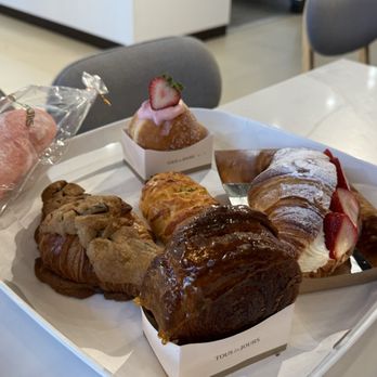 Tous les Jour - Crookie, strawberry bread, strawberry croissant, strawberry donut, brûlée wheel & cheese sausage roll - Bakeries Near Me - Colleyville, Texas Tous les Jour - Crookie, strawberry bread, strawberry croissant, strawberry donut, brûlée wheel & cheese sausage roll - Bakeries Near Me - Colleyville, Texas