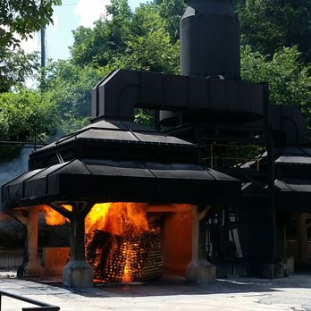 The Jack Daniel Distillery - Making the charcoal with a little of that white lightening! - Distilleries Near Me - Lynchburg, Tennessee