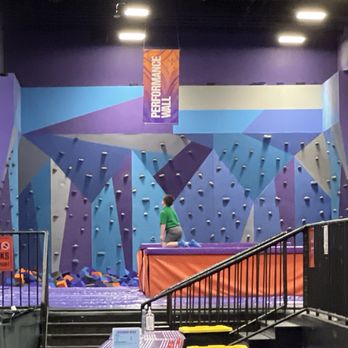 Altitude Trampoline Park - Rock climbing wall with safety foam. - Trampoline Parks Near Me - Katy, Texas