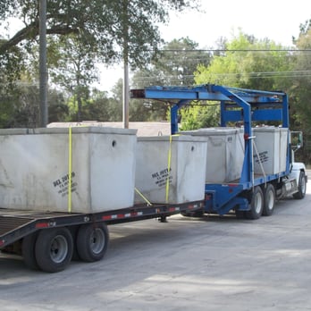 Triple S Plumbing - Rail Truck Hauling off a Load of Septic Tanks. - Plumbing Near Me - Keystone Heights, Florida Triple S Plumbing - Rail Truck Hauling off a Load of Septic Tanks. - Plumbing Near Me - Keystone Heights, Florida