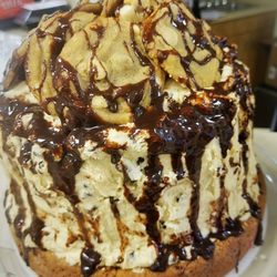 Lollie's Sweet Treats - A peanut butter cake on top of a 1 inch thick peanut butter cookie, topped with random chocolate chip cookies and chocolate ganache.