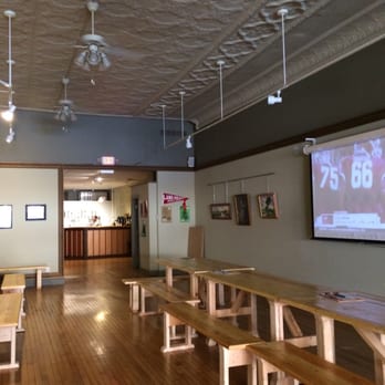 Eighteen-O-Three Taproom - ows a long table and benches - Beer Bar Near Me - Galion, Ohio Eighteen-O-Three Taproom - ows a long table and benches - Beer Bar Near Me - Galion, Ohio