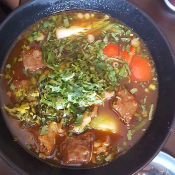 Noodle Man - Tomato beef brisket noodle soup. My friend unbutton to finish lol - Noodles Near Me - Virginia Beach, Virginia