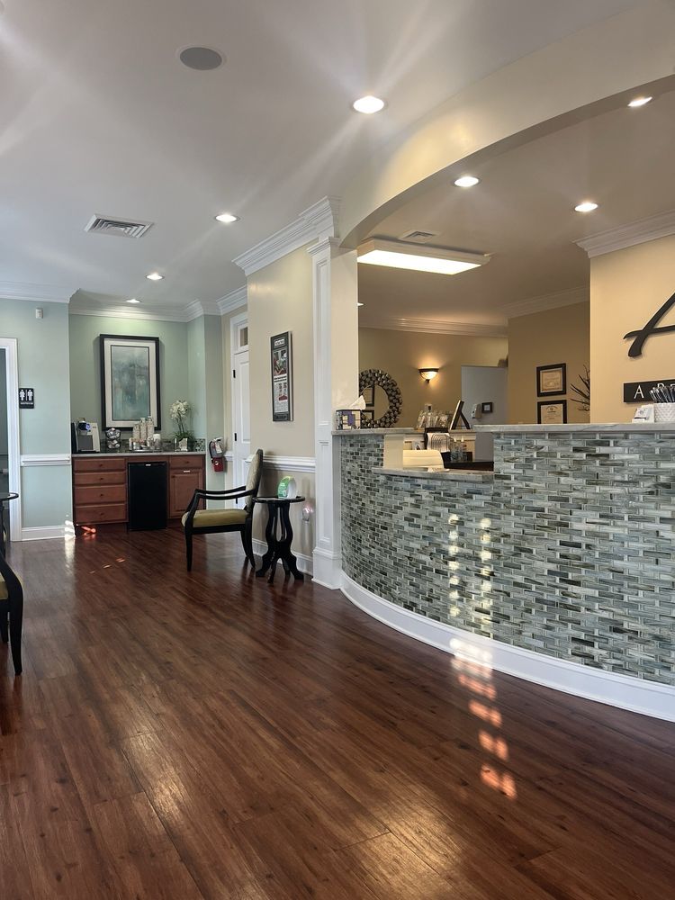 Gina Collins Mancini, DMD - A Beautiful Smile