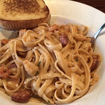 Orleans Seafood Kitchen - Pasta St Charles with garlic bread - Cajun/Creole Near Me - Katy, Texas Orleans Seafood Kitchen - Pasta St Charles with garlic bread - Cajun/Creole Near Me - Katy, Texas