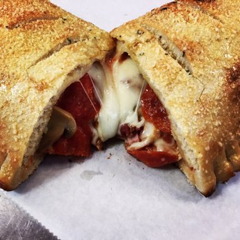 King's Pizza - Calzone from King's Pizza. Our calzones are homemade and really big! Try it, it's delicious! - Pizza Near Me - Orlando, Florida King's Pizza - Calzone from King's Pizza. Our calzones are homemade and really big! Try it, it's delicious! - Pizza Near Me - Orlando, Florida
