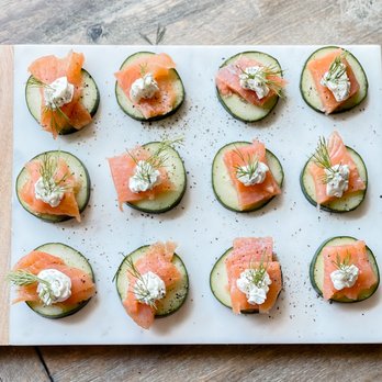 Fireova Pizza - a platter of cucumbers and salmon - Caterers Near Me