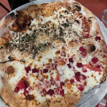 American Flatbread - Half and half large pizza! Half is "the revolution" and the other half was a special with orange and beets. - Pizza Near Me - Middlebury, Vermont