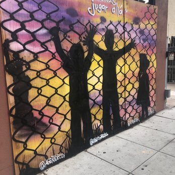 Barbed Wire Fence mural - People separated from Statute of Liberty. - Public Art Near Me - Oakland, California Barbed Wire Fence mural - People separated from Statute of Liberty. - Public Art Near Me - Oakland, California