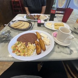 Huevos Revueltos Desayuno, Tamales de Elote, Carne Asada, all super delicious! Huevos Revueltos Desayuno, Tamales de Elote, Carne Asada, all super delicious!