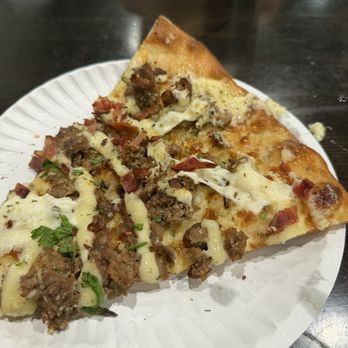 Krave It Pizza & Sandwich Joint - Steak and bacon Steak Truffle pizza - Sandwiches Near Me - Bayside, New York Krave It Pizza & Sandwich Joint - Steak and bacon Steak Truffle pizza - Sandwiches Near Me - Bayside, New York