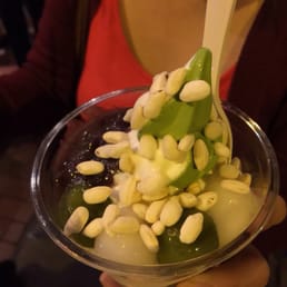 Rice crisps, green matcha ice cream and vanilla ice cream with red bean and Mochi in a cup Rice crisps, green matcha ice cream and vanilla ice cream with red bean and Mochi in a cup