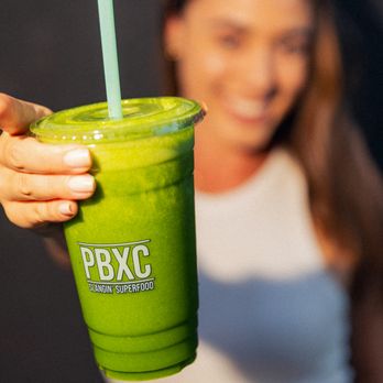 Trū Bowl - Woman holding a vibrant green PBXC superfood smoothie, highlighting fresh ingredients and a refreshing blend made for everyday wellness. - Juice Bars & Smoothies Near Me - Queen Creek, Arizona Trū Bowl - Woman holding a vibrant green PBXC superfood smoothie, highlighting fresh ingredients and a refreshing blend made for everyday wellness. - Juice Bars & Smoothies Near Me - Queen Creek, Arizona