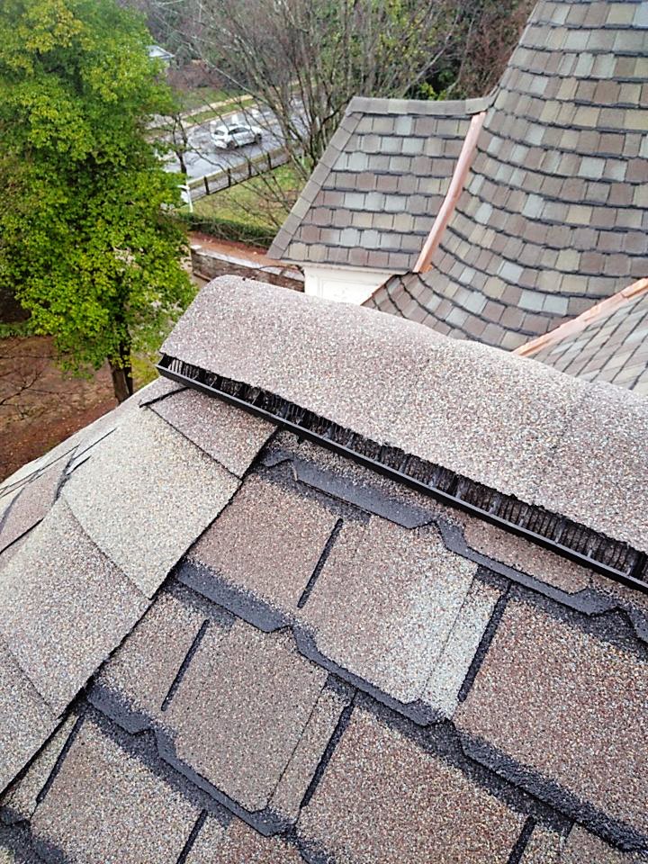 Slide of Henderson Roofing