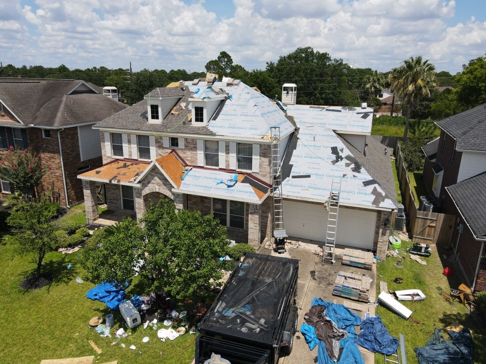 Slide of Moss Roofing Houston