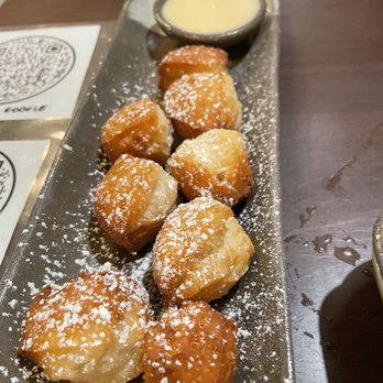 Sushiato - Parkland - a tray of powdered sugared doughnuts - Sushi Bars Near Me - Parkland, Florida