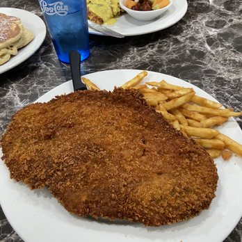 Sweet Basil Cafe - Pork tenderloin with no bun. The size of the plate! - American Near Me - Peoria, Illinois