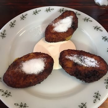 Perla Escondida - Rellenitos (these are plantains stuffed with blacks beans, sprinkled with sugar and served with crema) - Mexican Near Me - Lake Worth, Florida