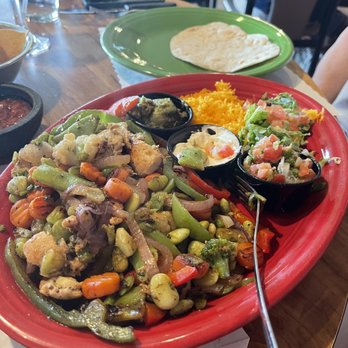 Del's Restaurant - Our chicken fajitas with yummy grilled veggies. We shared them and asked for extra flour tortillas. - Breakfast & Brunch Near Me - Tucumcari, New Mexico Del's Restaurant - Our chicken fajitas with yummy grilled veggies. We shared them and asked for extra flour tortillas. - Breakfast & Brunch Near Me - Tucumcari, New Mexico