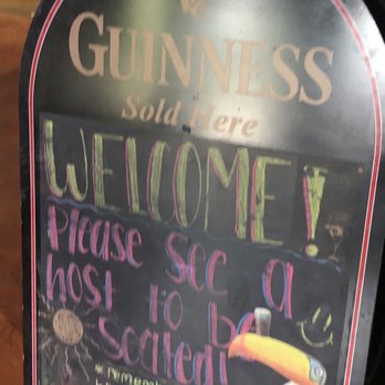 Winking Lizard Tavern - a guinness welcome sign - American Near Me - Canton, Ohio