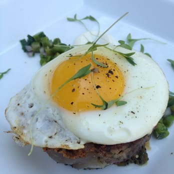 Longman & Eagle - Tete de Cochon with green enchiladas and fried egg. - Gastropubs Near Me - Chicago, Illinois Longman & Eagle - Tete de Cochon with green enchiladas and fried egg. - Gastropubs Near Me - Chicago, Illinois