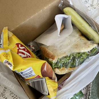 Apple Spice Junction - generous sandwich with condiment packs wrapped with sandwich. - Sandwiches Near Me - Rancho Dominguez, California