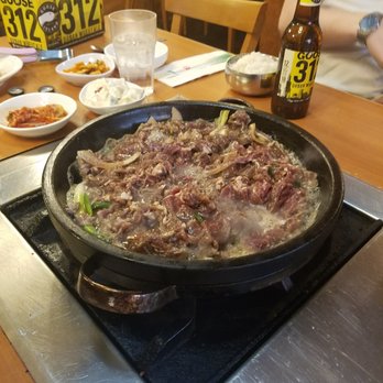 Cho Sun Ok Restaurant - Bulgogi and our BYOB beers in the background. - Korean Near Me - Chicago, Illinois Cho Sun Ok Restaurant - Bulgogi and our BYOB beers in the background. - Korean Near Me - Chicago, Illinois