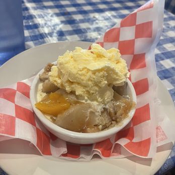 The Jay Cafe - Peach cobbler with, bluebell, vanilla ice cream. - Desserts Near Me - Lake Jackson, Texas The Jay Cafe - Peach cobbler with, bluebell, vanilla ice cream. - Desserts Near Me - Lake Jackson, Texas