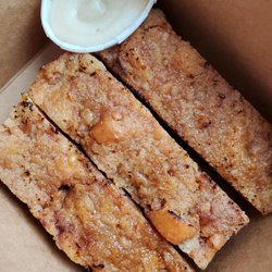 Cinnamon toast dippers. Cinnamon roll bread and butter pudding, bruléed with sugar on top, served with maple cream cheese dip.