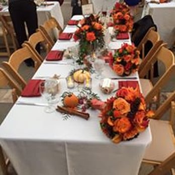 Every Last Detail - guest table with bridesmaids' bouquets - Wedding Planning Near Me