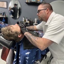 Clipping Along - Let this be your place to come and treat yourself. Hot towel shaves are by appointment only.